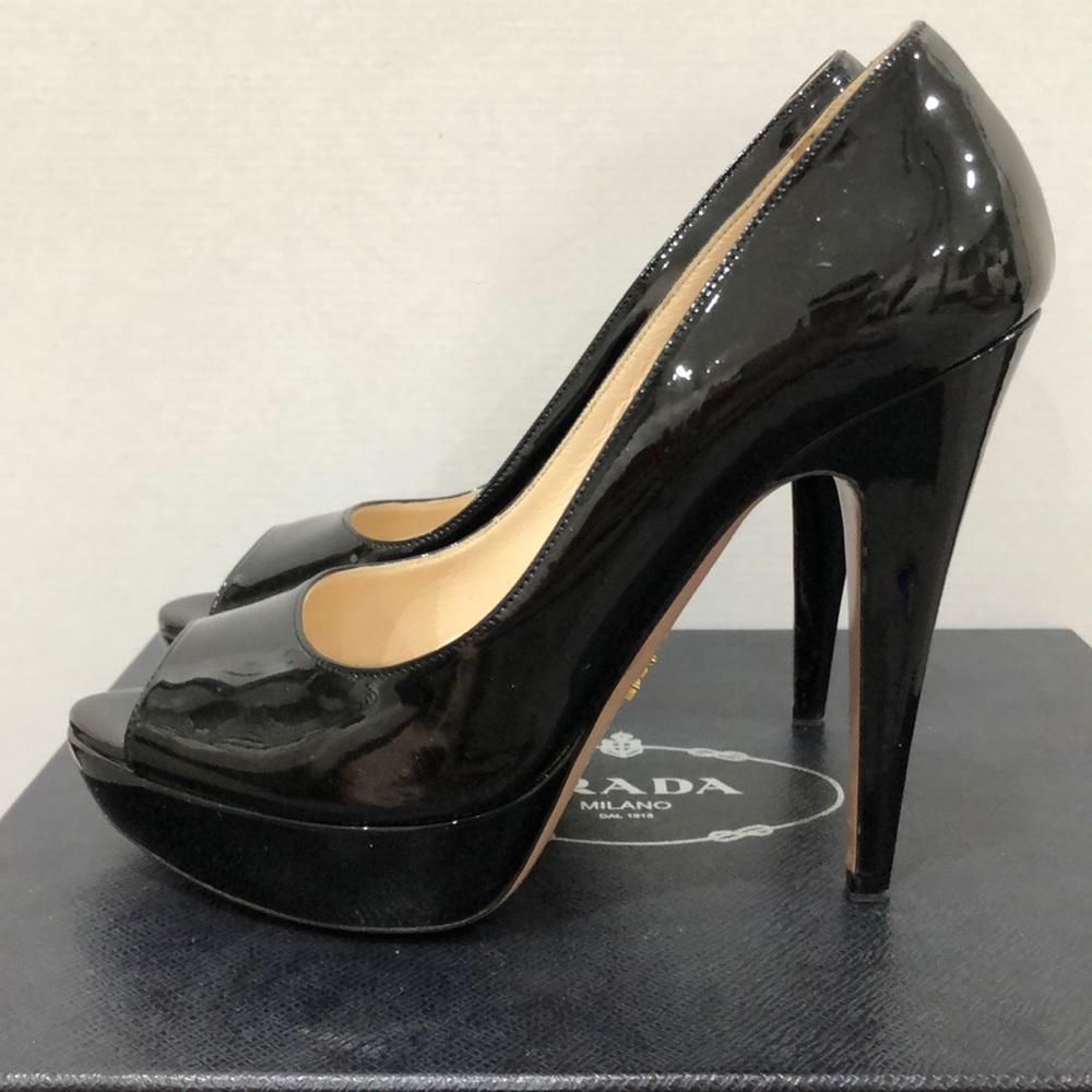 5 in black peep toe Prada stilettos